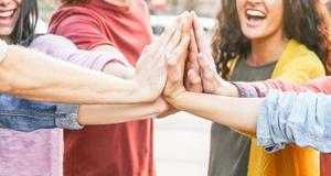 group of people holding hands