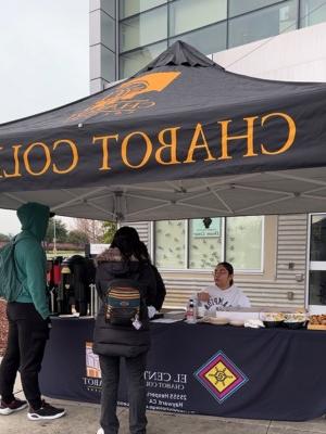 students at a welcome booth